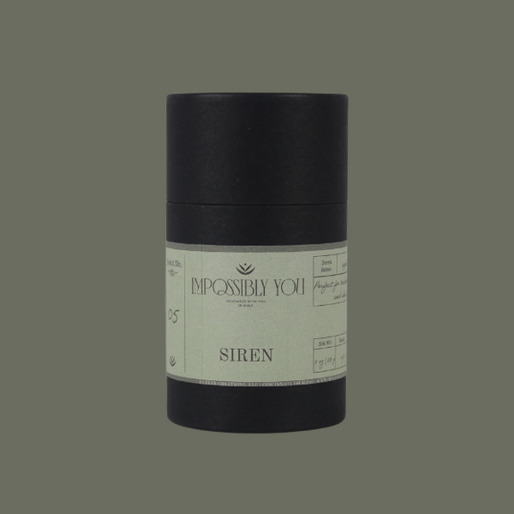 Impossibly You Siren scented soy wax melts with a green background.