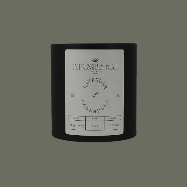 Impossibly you lavender and calendula bath salts with a green background