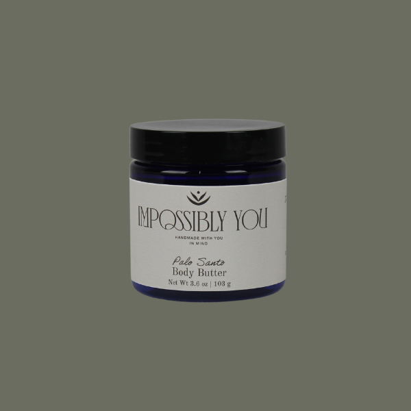 Impossibly you palo santo scented body butter with a green background